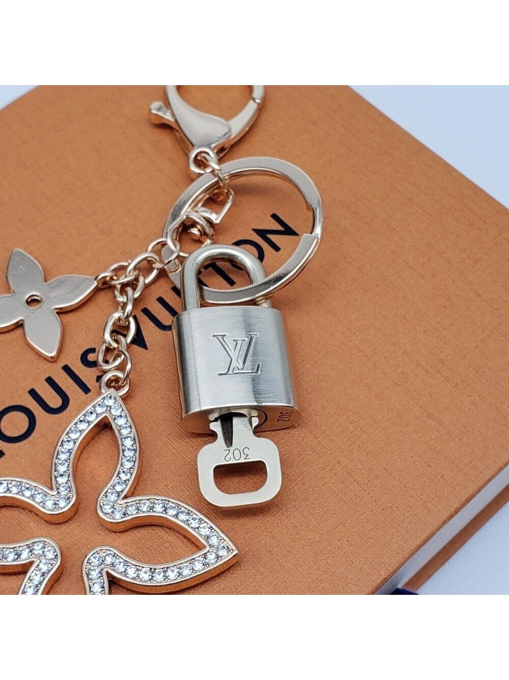 Authentic Louis Vuitton Gold Lock & Box w/ Unbranded Clover Bagcharm - Picture 3 of 9
